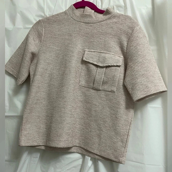 Reserved mesh and knit mock turtleneck shirt with front pocket and back zipper. - Picture 1 of 5